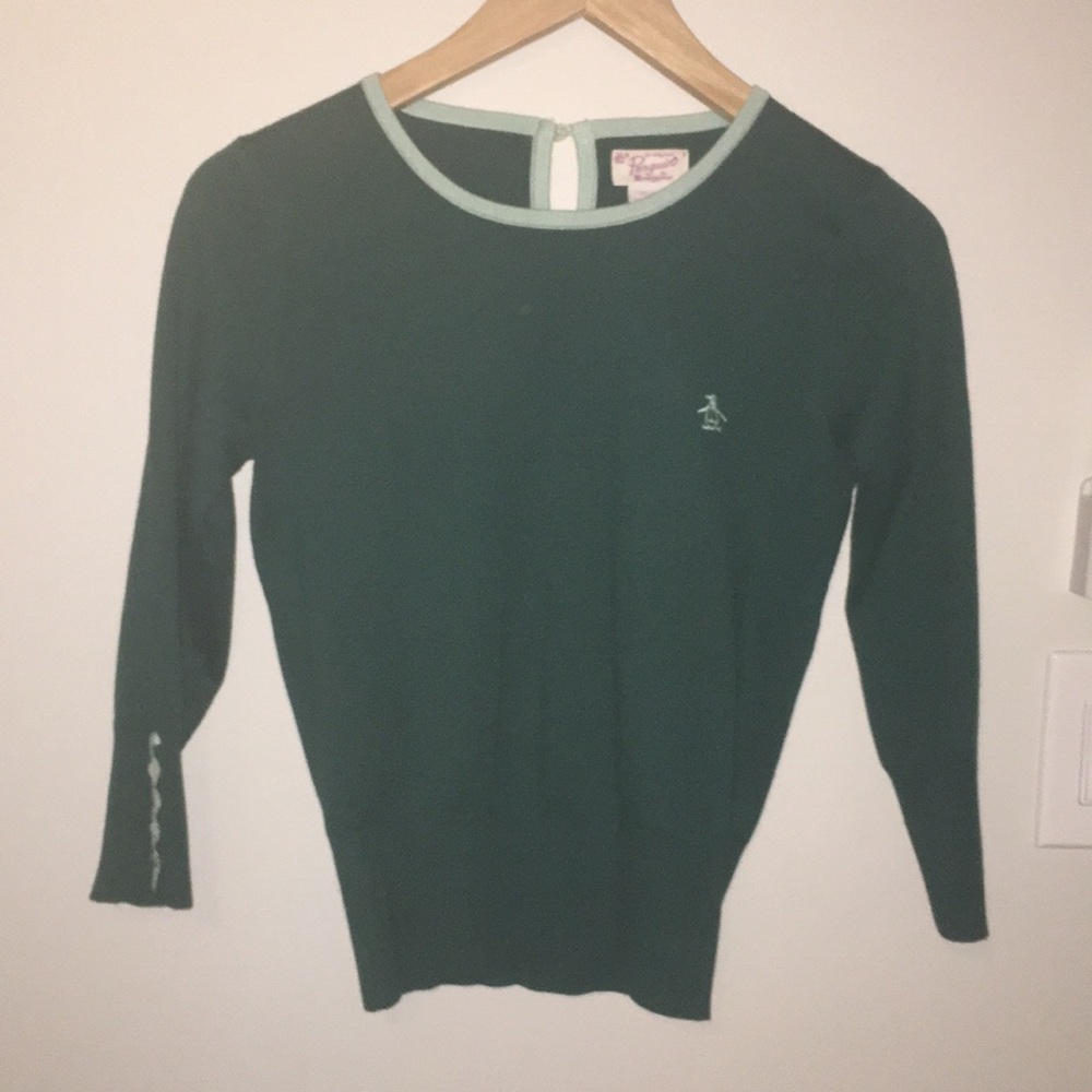 blue-green penguin sweater
